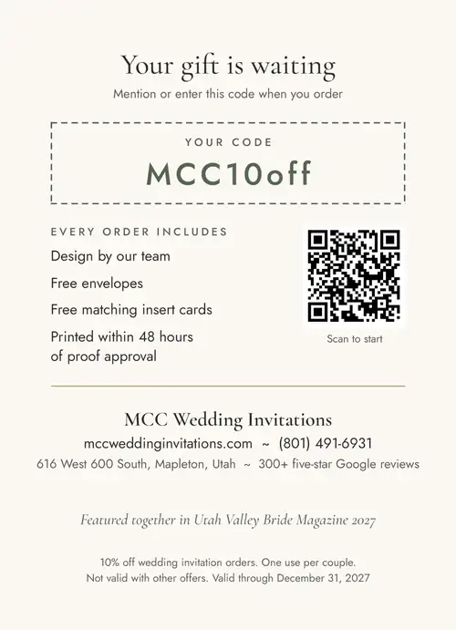 5x7 card back: Your gift is waiting, the partner code, what every order includes, a QR code, MCC Wedding Invitations contact details, featured in Utah Valley Bride Magazine 2027